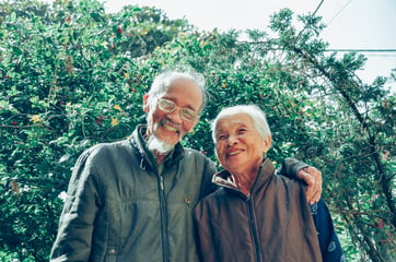 smiling-man-and-woman-wearing-jackets-1642883